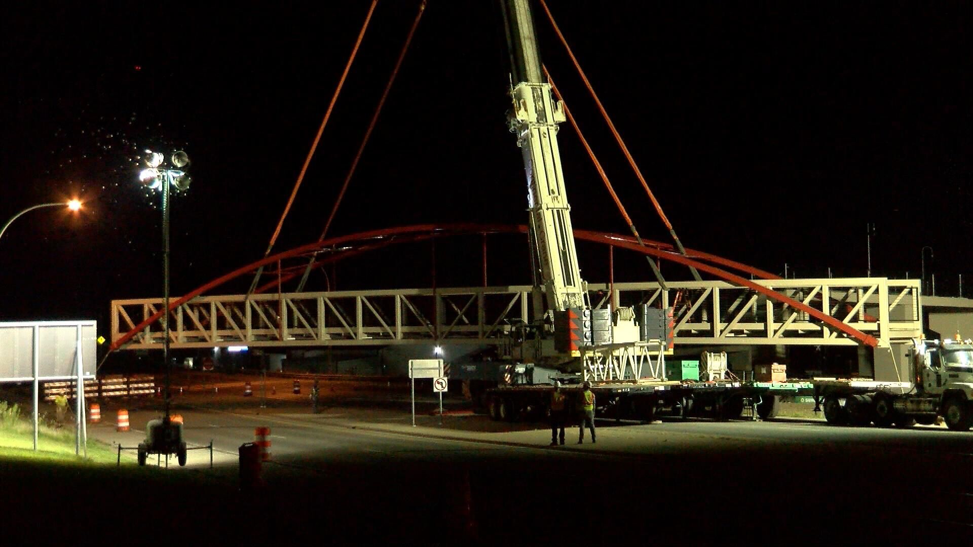 Crane lifting the bridge